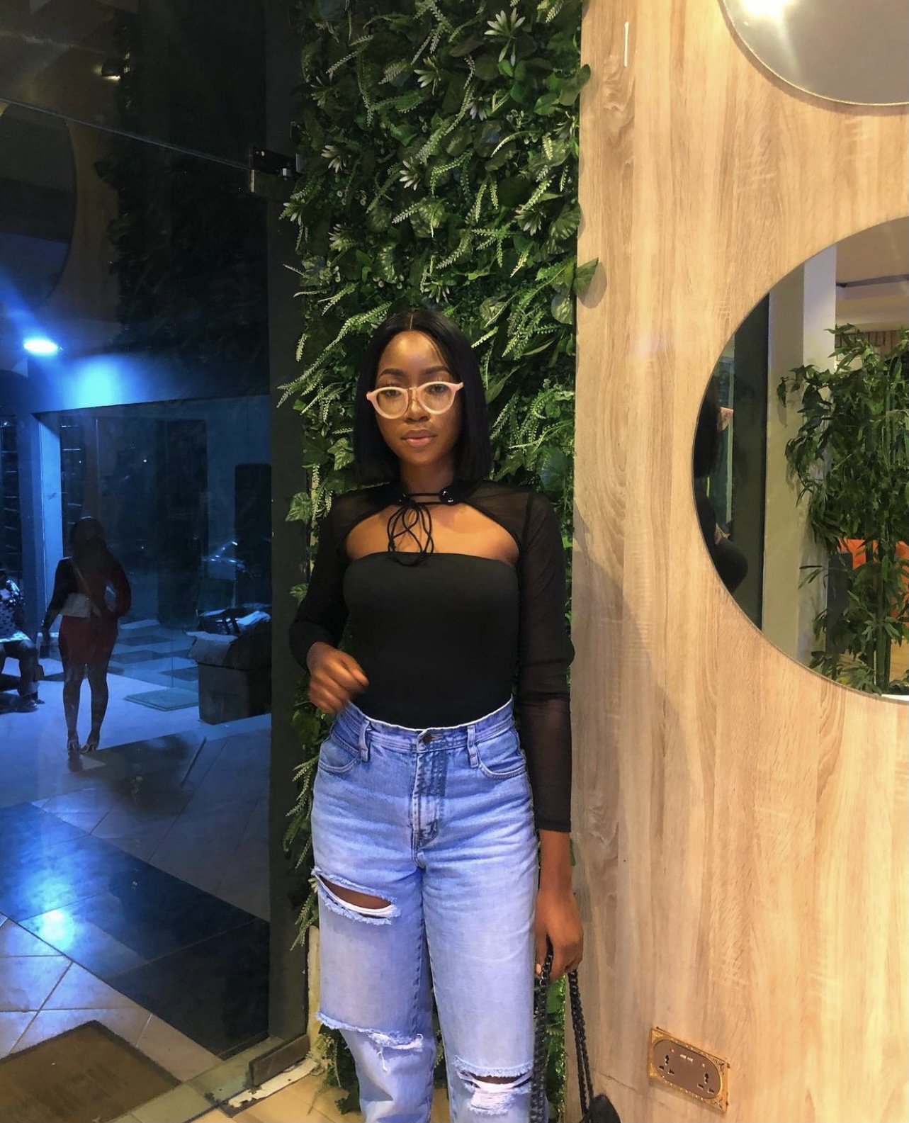 The finest net bodysuit & ripped jeans image