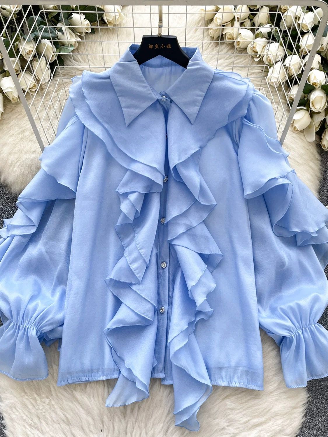 Tipping the glass blouse BE374 image