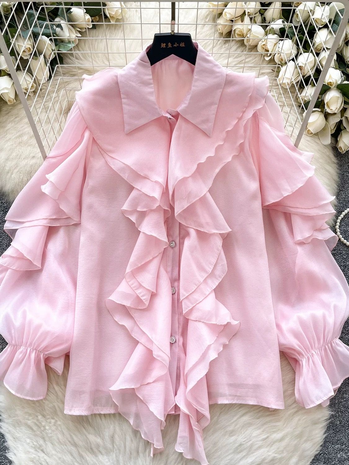 Tipping the glass blouse BE374 image