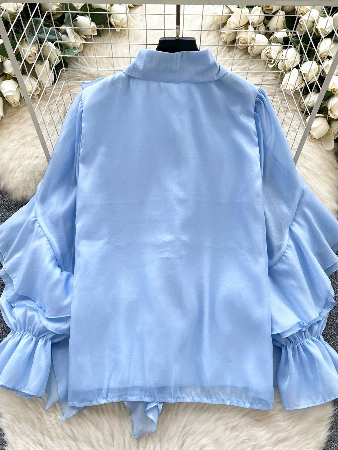 Tipping the glass blouse BE374 image