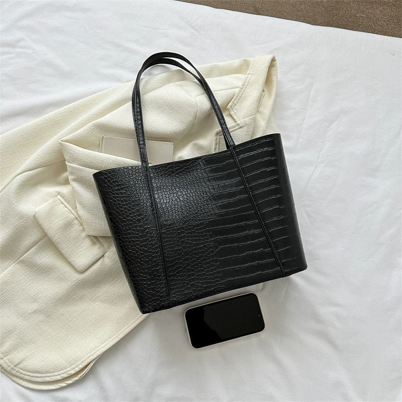 Your laptop can fit into me bag image